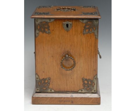 An Edwardian oak novelty biscuit box or tea caddy, as a fall-front 'perdonium', applied to the angles with pierced cut-card w
