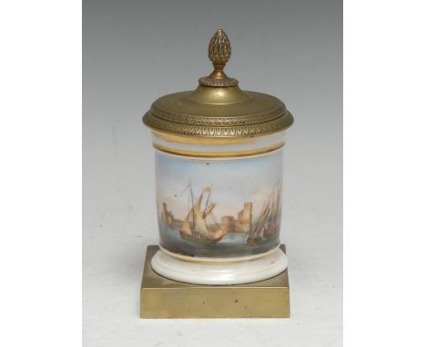 A French Empire porcelain and brass desk inkwell, painted with a maritime scene, the cover with pine cone finial, square base
