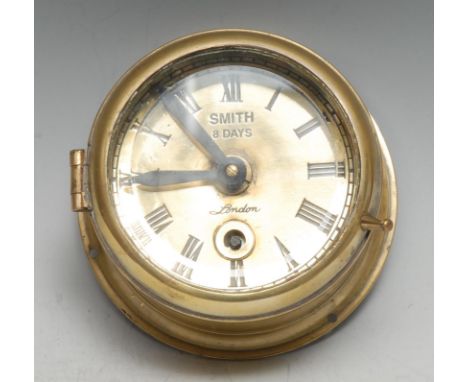 A brass marine timepiece, of small proportions, 8.5cm clock dial inscribed Smith, London, Roman numerals, eight-day movement,