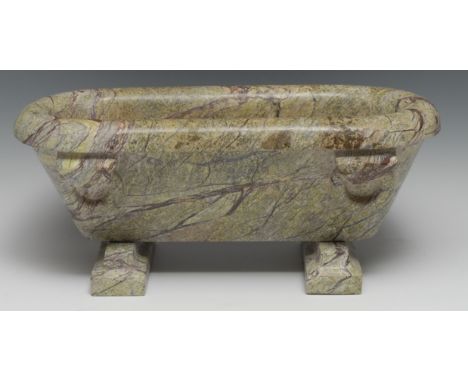 A Grand Tour style marbled stone cistern or trough, carved after the Roman with rings, 41cm wide 