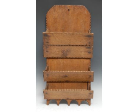 Treen - a 19th century pine wall hanging spoon or pipe rack, dot-punched overall with flowers, leafy stems and lozenges, notc