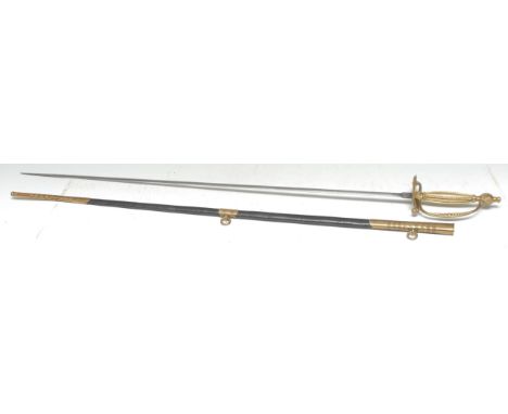 A British court sword, 79cm long slender double edged blade, etched,  gilt brass hilt with beaded shell guard and urn pommel,