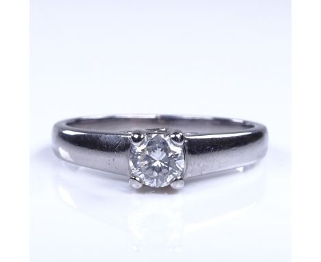 A modern platinum 0.25ct solitaire diamond ring, size K, 3.9gVery good overall condition, diamond is quite included with vari