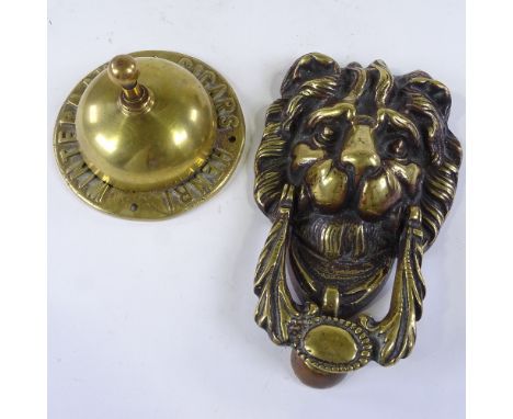 A Henri Winterman's Cigars brass advertising desk bell, diameter 10.5cm, and a cast brass lion mask door knocker (2) 