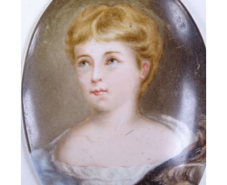 A 19th century Continental painted porcelain plaque, portrait of a child, 12.5cm x 9cm 