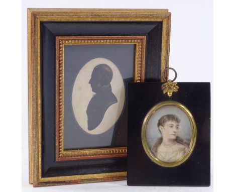 A miniature watercolour on ivory, portrait of a lady, unsigned, in ebonised frame, overall 11.5cm x 9cm, and a hand painted a