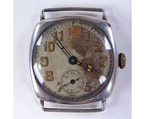 A First War Period silver cushion-cased mechanical wristwatch head, silvered dial with Arabic numerals and subsidiary seconds