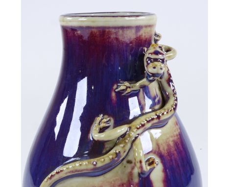 A Chinese blue glaze porcelain vase, with applied dragon decorated neck, impressed seal mark, height 17cmPerfect condition 