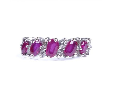 A late 20th century 18ct white gold ruby and diamond half hoop ring, setting height 5.7mm, size M, 3.9gGood overall condition