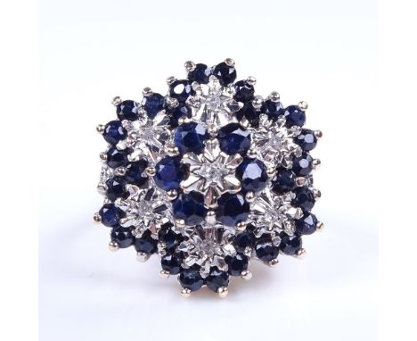 A large late 20th century 9ct gold sapphire and diamond cluster cocktail ring, setting height 18.7mm, size K, 4.5gExcellent o