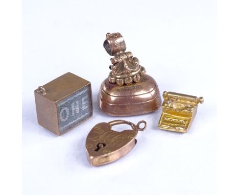 Various 9ct gold charms and fobs, including heart padlock, typewriter, seal etc, 10.6g grossGenerally good overall condition,