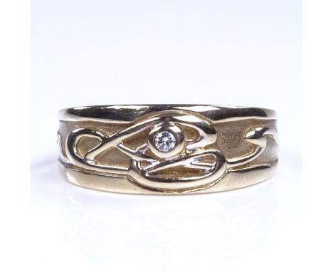 A Welsh Clogau 9ct gold diamond Celtic band ring, setting height 8.1mm, size S, 4gVery good original condition, no damage or 