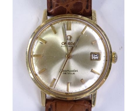 OMEGA - a Vintage 18ct gold Seamaster Deville automatic wristwatch, champagne dial with gilt baton hour markers, date apertur