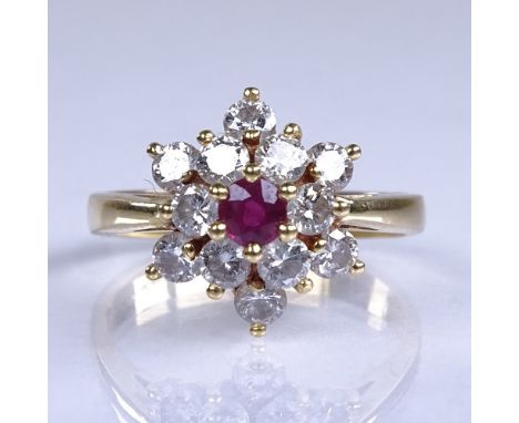 A late 20th century 18ct gold ruby and diamond cluster snowflake dress ring, total diamond content approx 0.6ct, setting heig