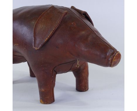 A Vintage brown leather pig stool, thought to be Liberty & Co, length 62cm 