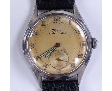 TISSOT - a Vintage stainless steel Bumper automatic wristwatch, ref. 6536-1, champagne dial with Arabic numerals and subsidia