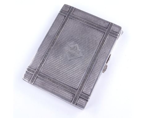 JUDAICA - a Second War Period German cast-silver compact, allover engine turned decoration with Star of David cartouche, inte