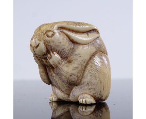 A Japanese carved ivory hare netsuke, Meiji Period, height 3cm 