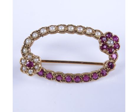 A late 20th century 9ct gold ruby and split pearl floral oval brooch, brooch length 31.2mm, 3.1gVery good original condition,