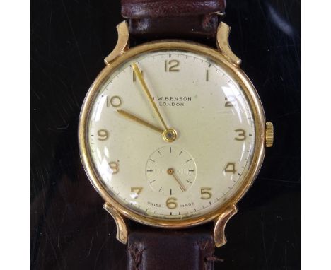 J W BENSON - a Vintage 9ct gold mechanical wristwatch, circa 1954, ref. 13851, silvered dial with gilt Arabic numerals and su