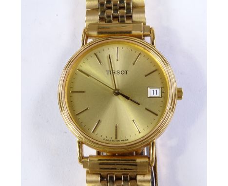 TISSOT - a Vintage gold plated stainless steel quartz wristwatch, ref. C282K, champagne dial with gilt baton hour markers and
