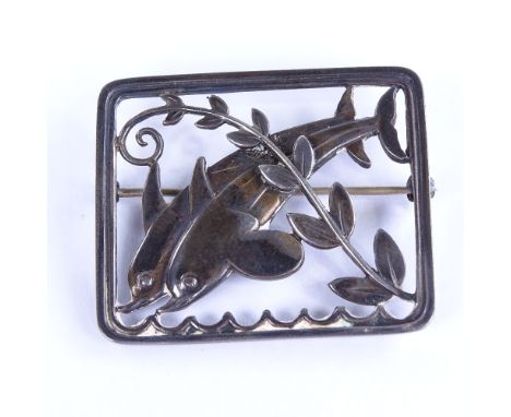 GEORG JENSEN - a late 20th century Danish stylised sterling silver double-dolphin brooch, model no. 251, import marks London 