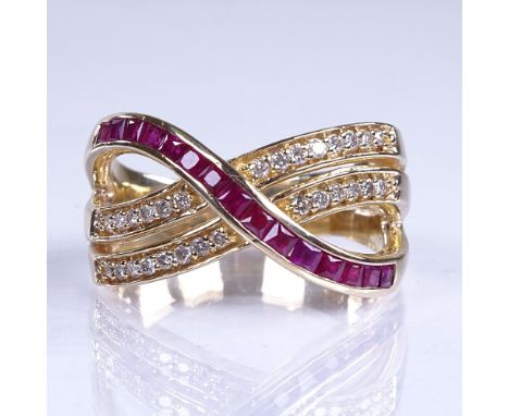 A large modern 14ct gold ruby and diamond crossover dress ring, total diamond content approx 0.5ct, stamped Bita, setting hei