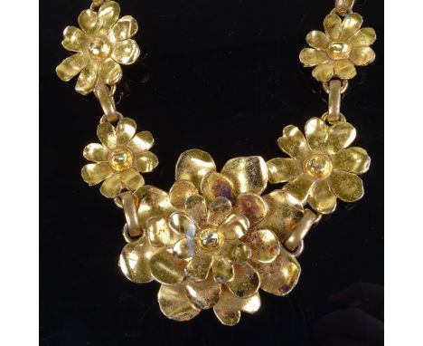 CHRISTIAN LACROIX - a large Vintage French gilt-metal flowerhead necklace, necklace length 70cm, 224.6gGood overall condition