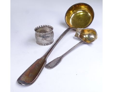 A large 19th century German silver Fiddle pattern punch ladle, a German silver Fiddle pattern sauce ladle, and a silver plate