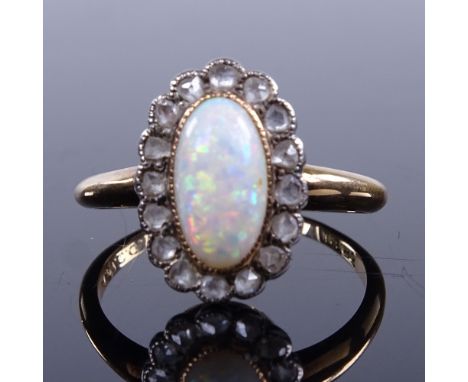 An 18ct gold cabochon opal and rose-cut diamond cluster dress ring, setting height 14.4mm, size O, 2.9gGood overall condition