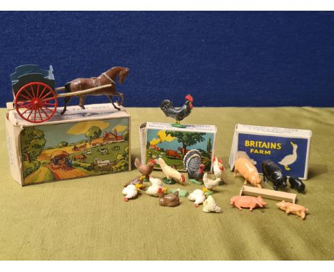 A boxed Britains No.138F 4 furrow Plough, a of No.5029 Farmer's Wife and Fowl  Box with fowl (no farmer's wife), a boxed Set 