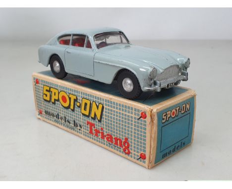 A boxed Tri-ang Spot-on grey Aston Martin, VG, box G