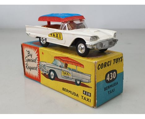A boxed Corgi Toys No.430 Bermuda Taxi, G (canopy has a crack in top), box Ex