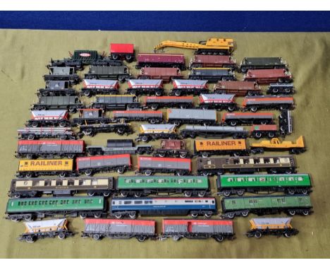 A box of unboxed 00 gauge Rolling Stock including Pullman Coaches, SR Corridor Coaches, Railfreight Wagons, Mineral Wagons, B