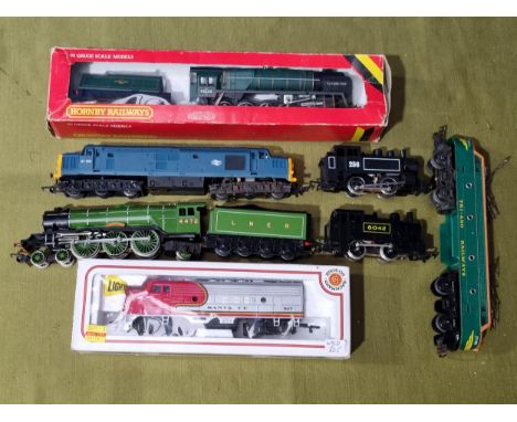 A part boxed Hornby 00 gauge 9F 'Evening Star', an unboxed Triang Hornby 'Flying Scotsman', an unboxed Hornby Class 37, an un