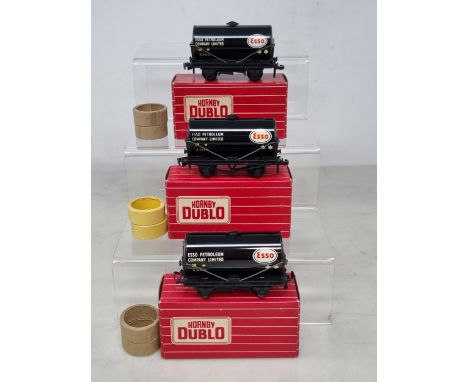 A Hornby Dublo reference set of three boxed 4680 black Esso Tankers including metal coupling, plastic coupling closed brake g