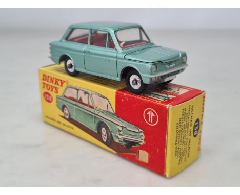 A boxed Dinky Toys No.138 metallic green Hillman Imp with suitcase, M, box superb