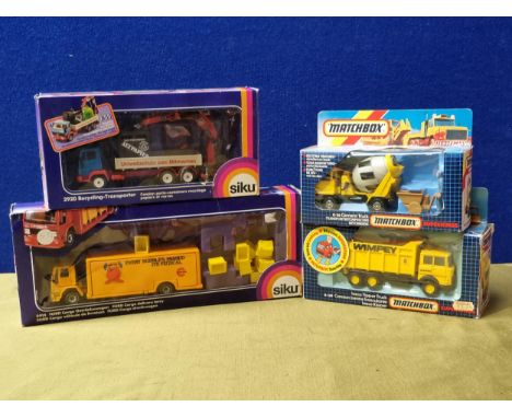 Two boxed Siku Models including 2918 Ford Cargo Lorry and 2920 Recycling Lorry, a boxed Matchbox K-26 Cement Truck and a boxe