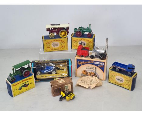 A boxed Benbros Stephenson's Rocket, a boxed Tria-ang Spot-on No.279 MG PB Midget, a boxed Benbros TV Series A.A. Motor Cycle