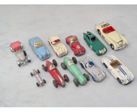 Nine play worn Dinky Toys including blue Sunbeam Alpine, Austin Healey, MG Midget, Bristol 450, Cunningham C5 Racer, etc., P-
