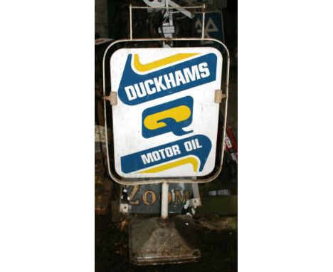 A Duckhams Motor Oil enamel and tin fore court swinging sign.