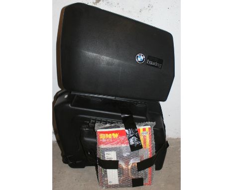 A pair of BMW K 100 touring panniers, together with a Haynes Manual