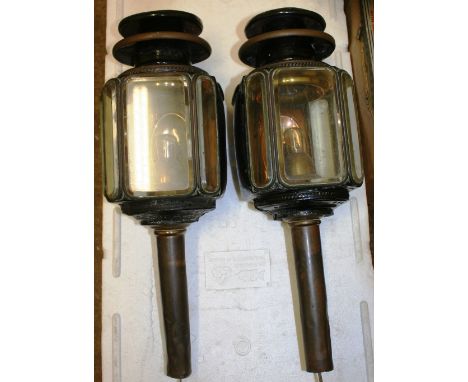 A pair of Victorian Rippon Brothers of Huddersfield carriage lamp, with five glass panels, length 48cm together with a pair o