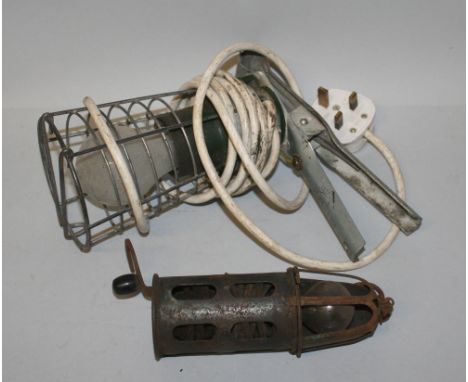 A vintage car battery powered inspection lamp, and a modern example (2).