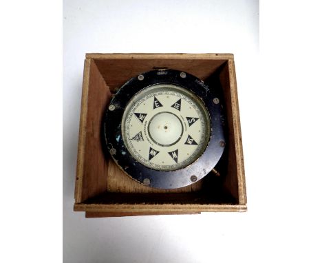 A Neptun ship's compass in a pine plywood box 