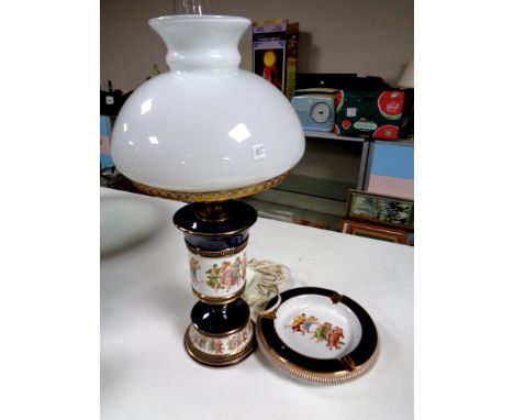 An Italian ceramic lamp with glass shade and matching ash tray  