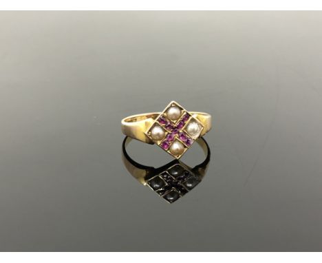 A 15ct gold ruby and seed pearl ring 
