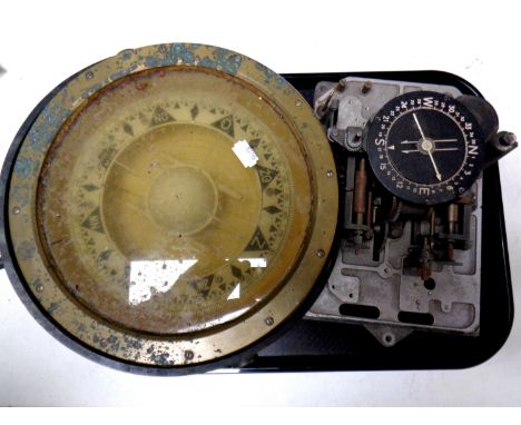 A 20th century brass ship's compass together with a further compass with mechanism 