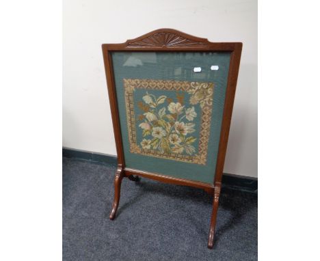 An Edwardian mahogany tapestry fire screen 