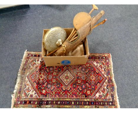 A box containing walking stick, yoke, Persian rug, brass and glass light fitting, clock weight 